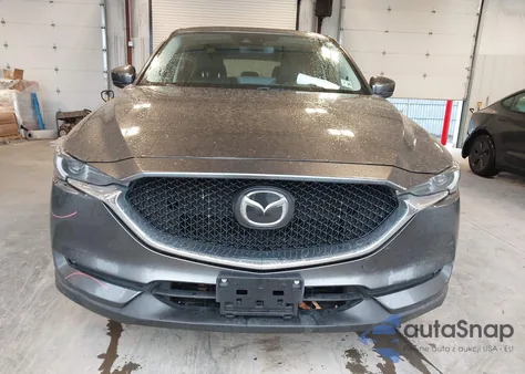2021 Mazda Cx-5 Grand Touring from USA, damaged, VIN JM3KFBDM9M0389914
